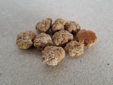 Dog treat balls after squishing and baking.
