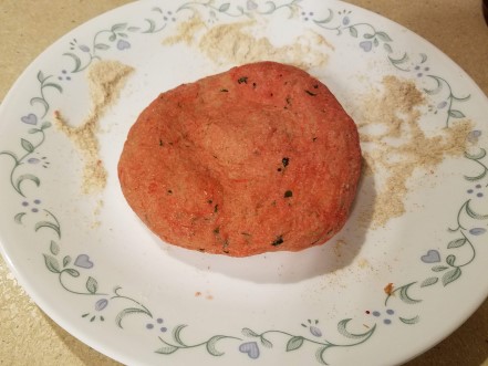 Dough with red food coloring mixed in.
