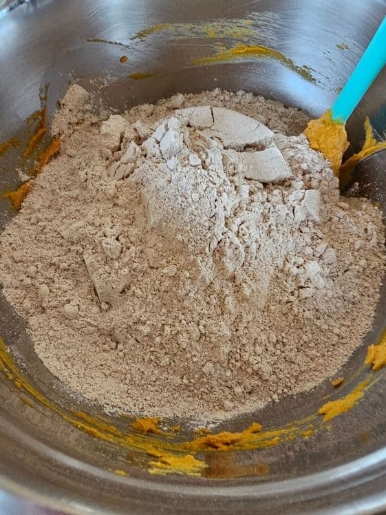 Flour added to the wet ingredients.
