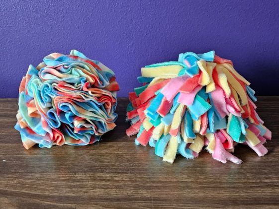 Two types of DIY snuffle balls sitting on a table.