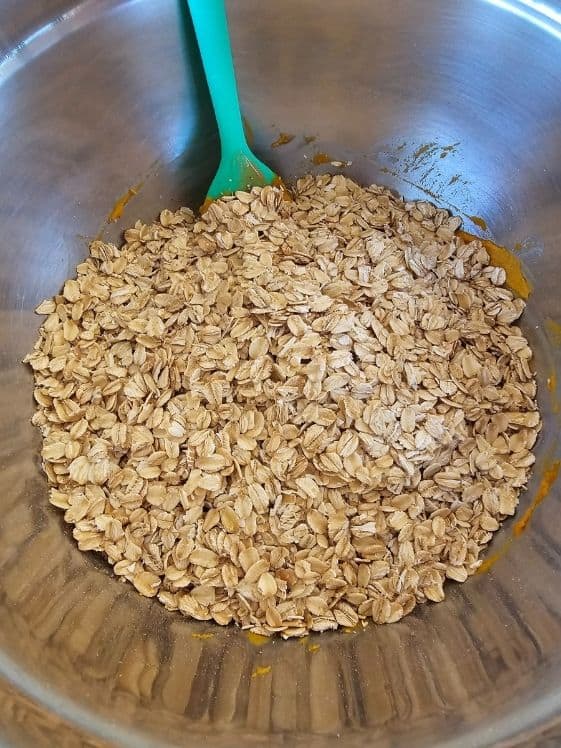 Add the oats to the wet ingredients.