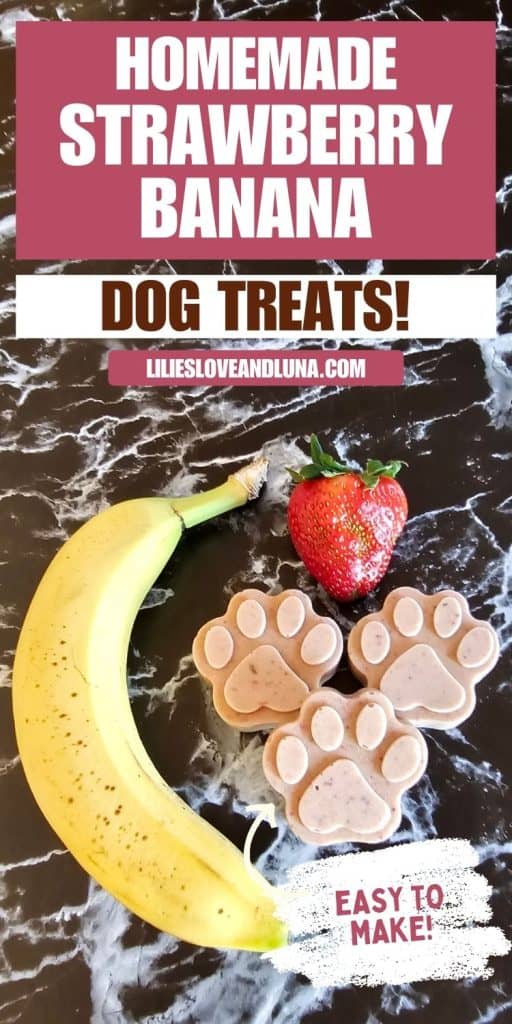 A banana and a strawberry are positioned next to paw-shaped homemade strawberry banana dog treats on a marble surface, highlighted by text promoting the treats as easy to make.