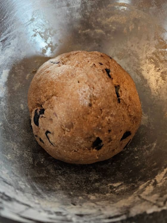 A ball of blueberry apple dog treats dough.