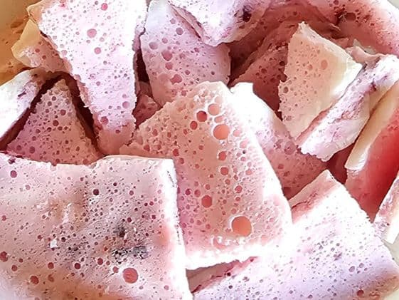 Close up of pink Christmas bark for dogs.
