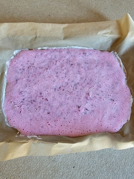 Frozen Christmas bark before breaking.