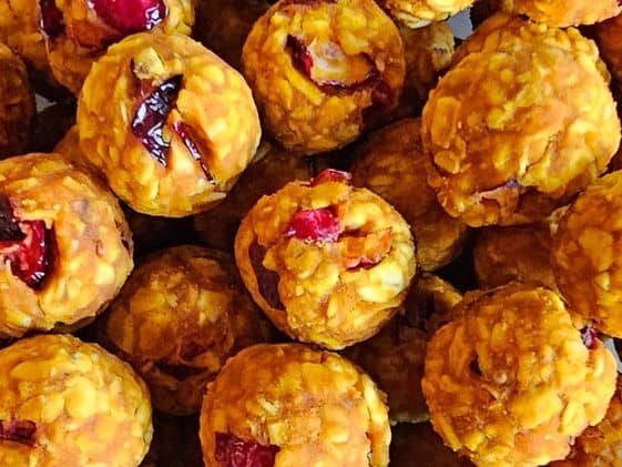 Close up of pumpkin cranberry oat balls for dogs.